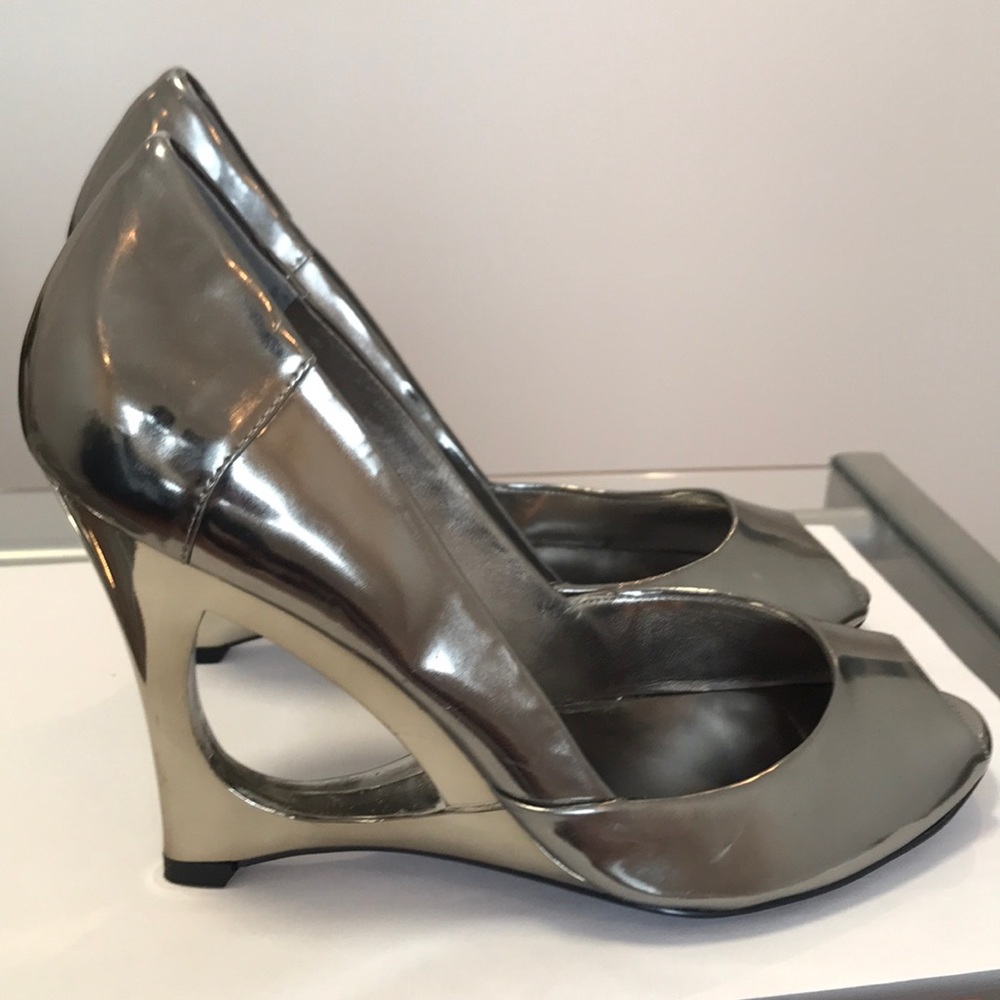 Guess by Marciano. Peep toe, cut out pump. Never worn.